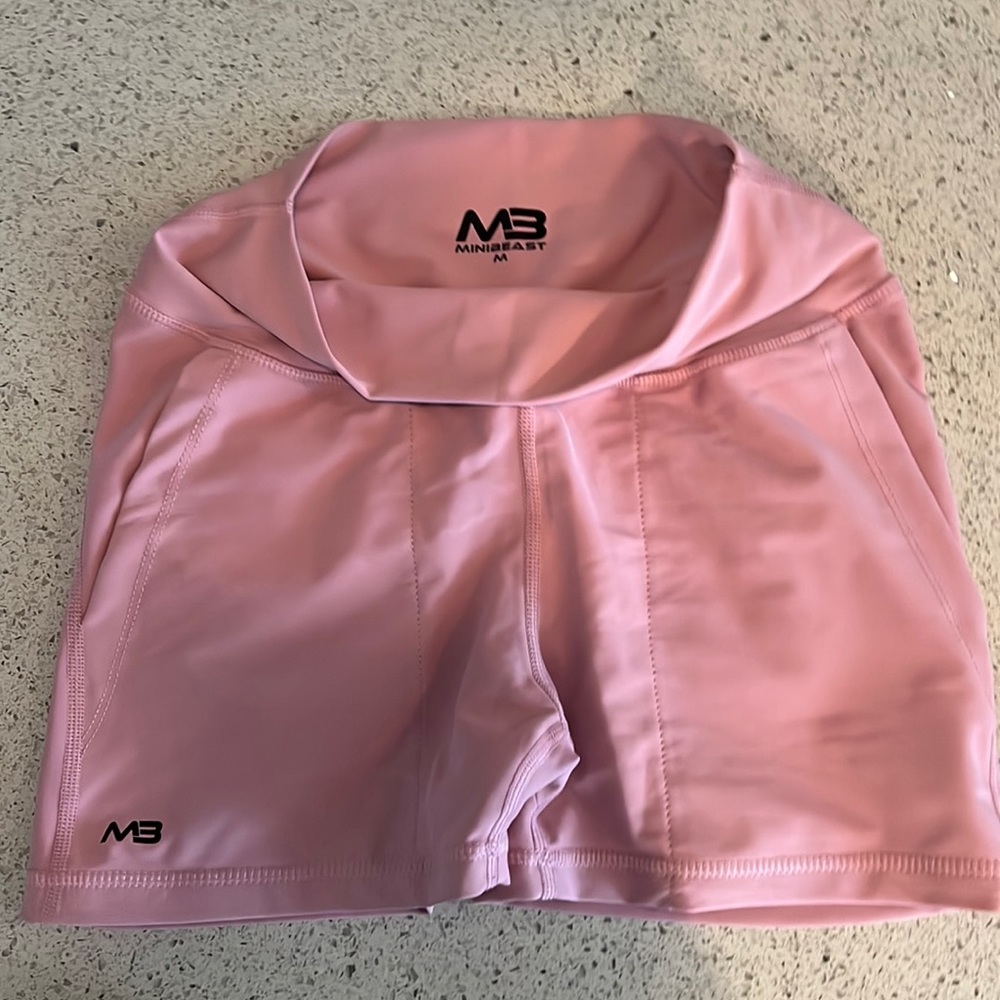 Mini beast mini pink cargo shorts with gold buttons and pockets